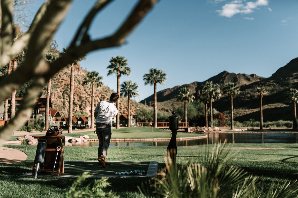 Golf course with mountain backdrop