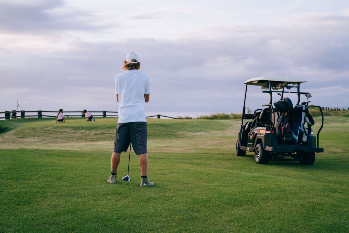 Jeju golf course fairway with trees and water features