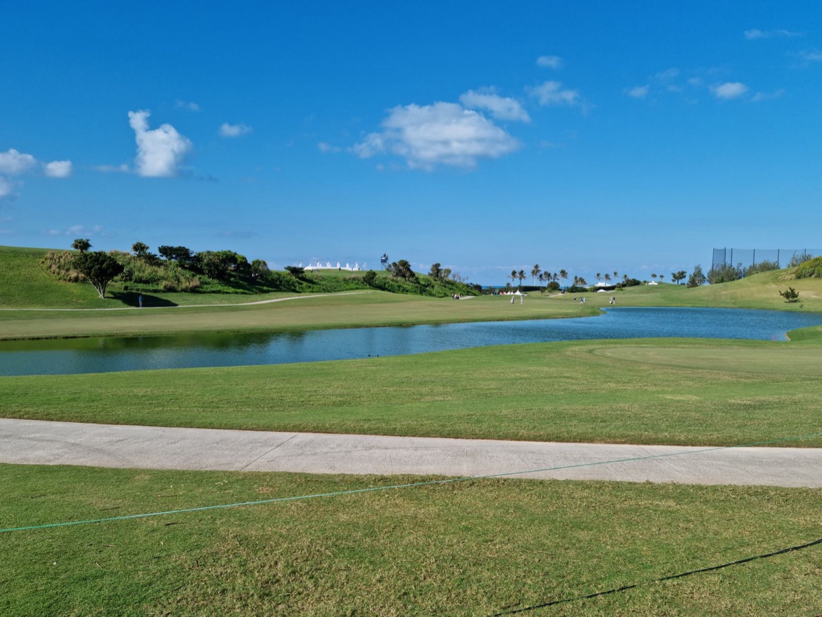 Golf course fairway with water hazard